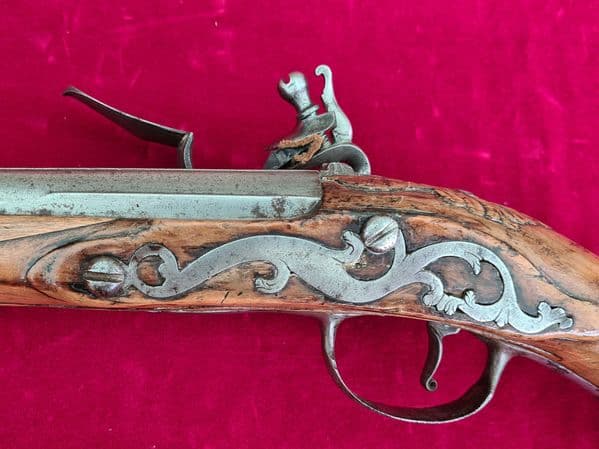 A very long German single barrel flintlock pistol. Circa 1720-1750. Ref 3196.